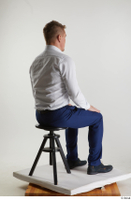  Steve Q  1 black oxford shoes blue trousers business dressed sitting white shirt whole body 0004.jpg